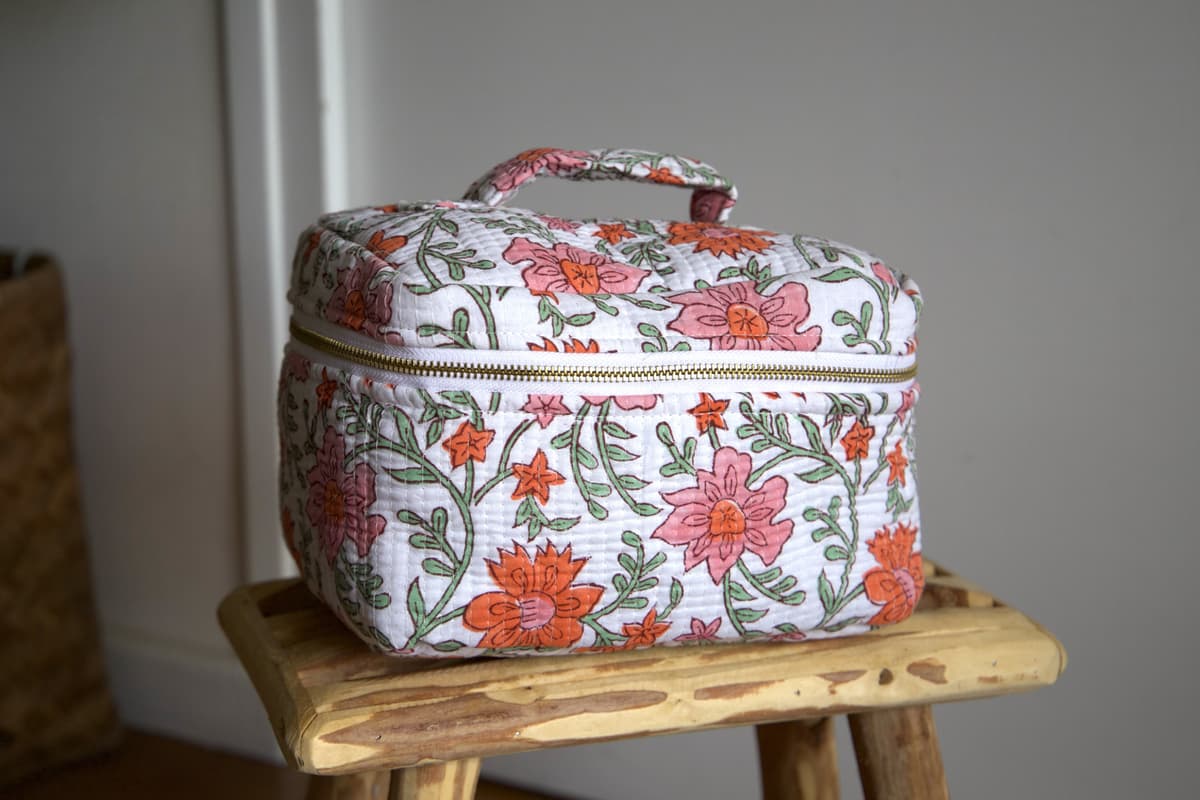 Trousse de toilette type vanity fleurs orange rose