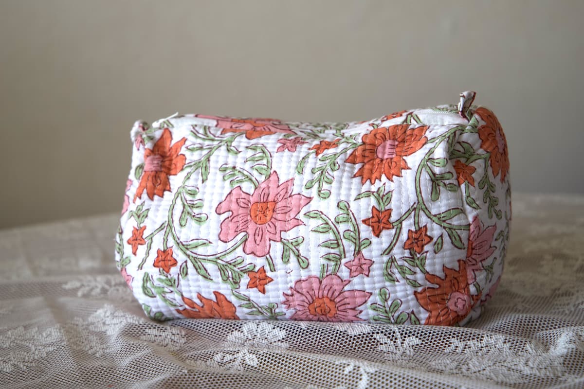 Trousse de toilette matelassée fleurs orange et rose